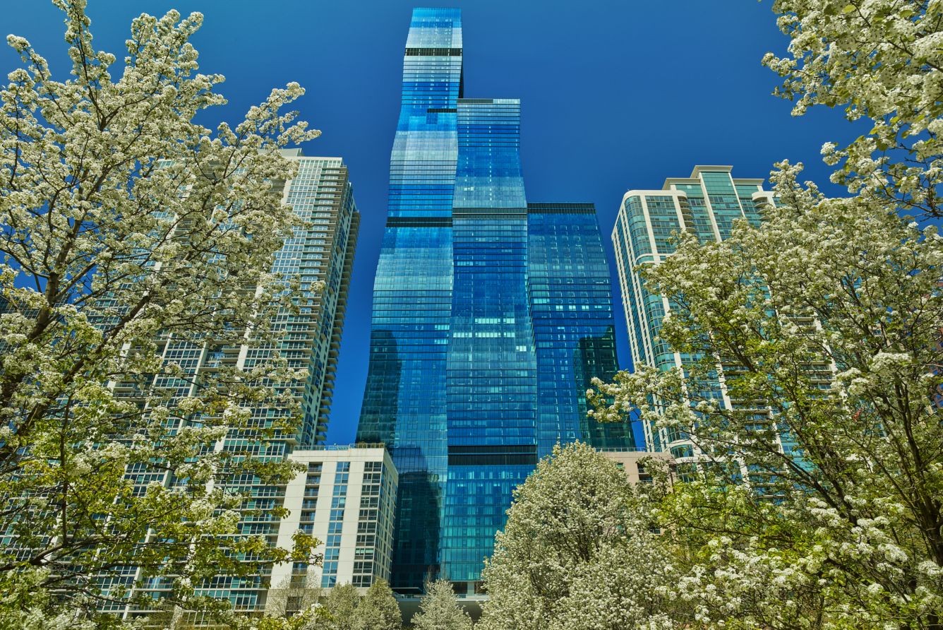 Exterior view of the St. Regis Chicago tower on the riverfront