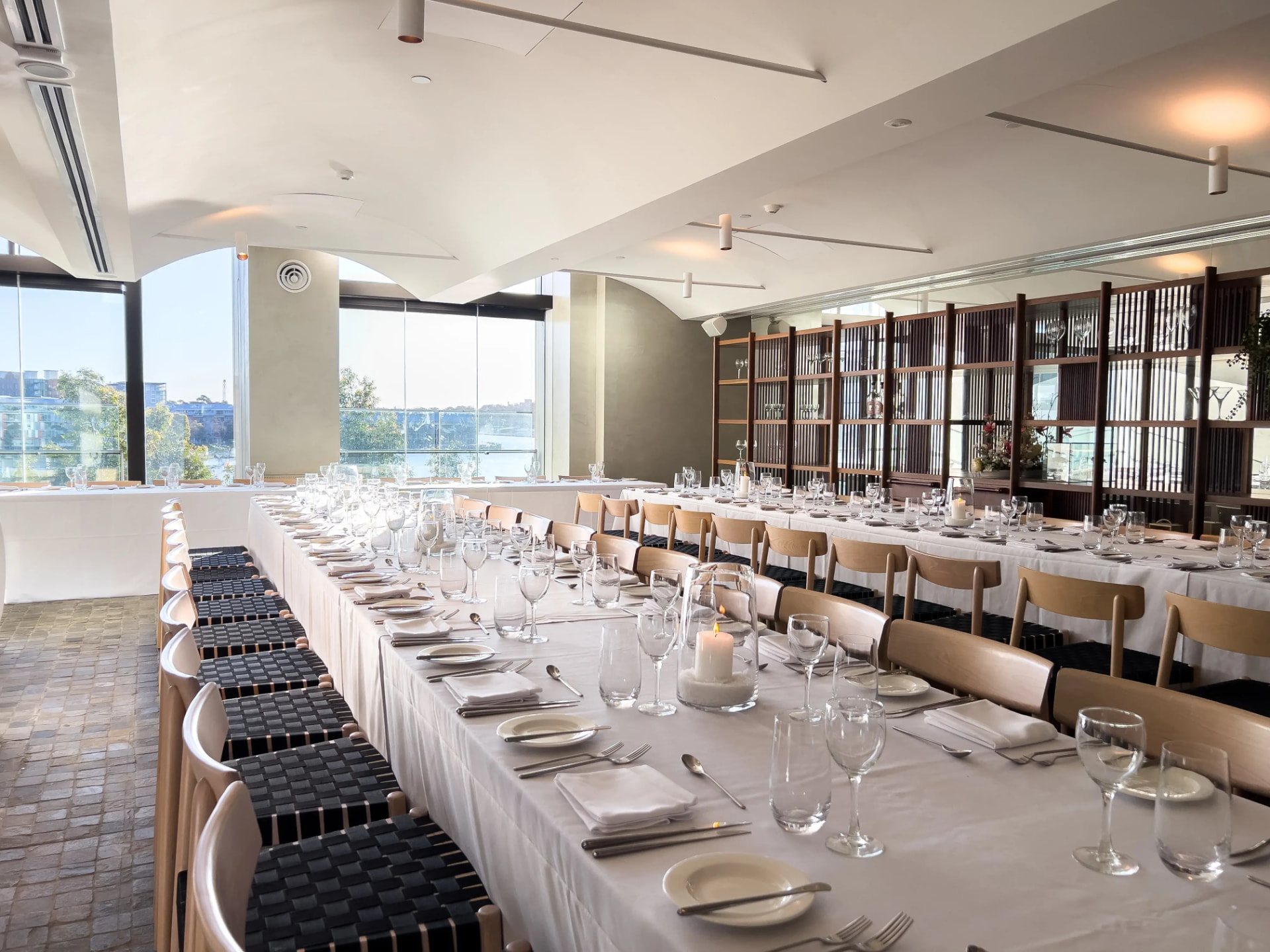 Banquet-style long tables in the Harbour Room