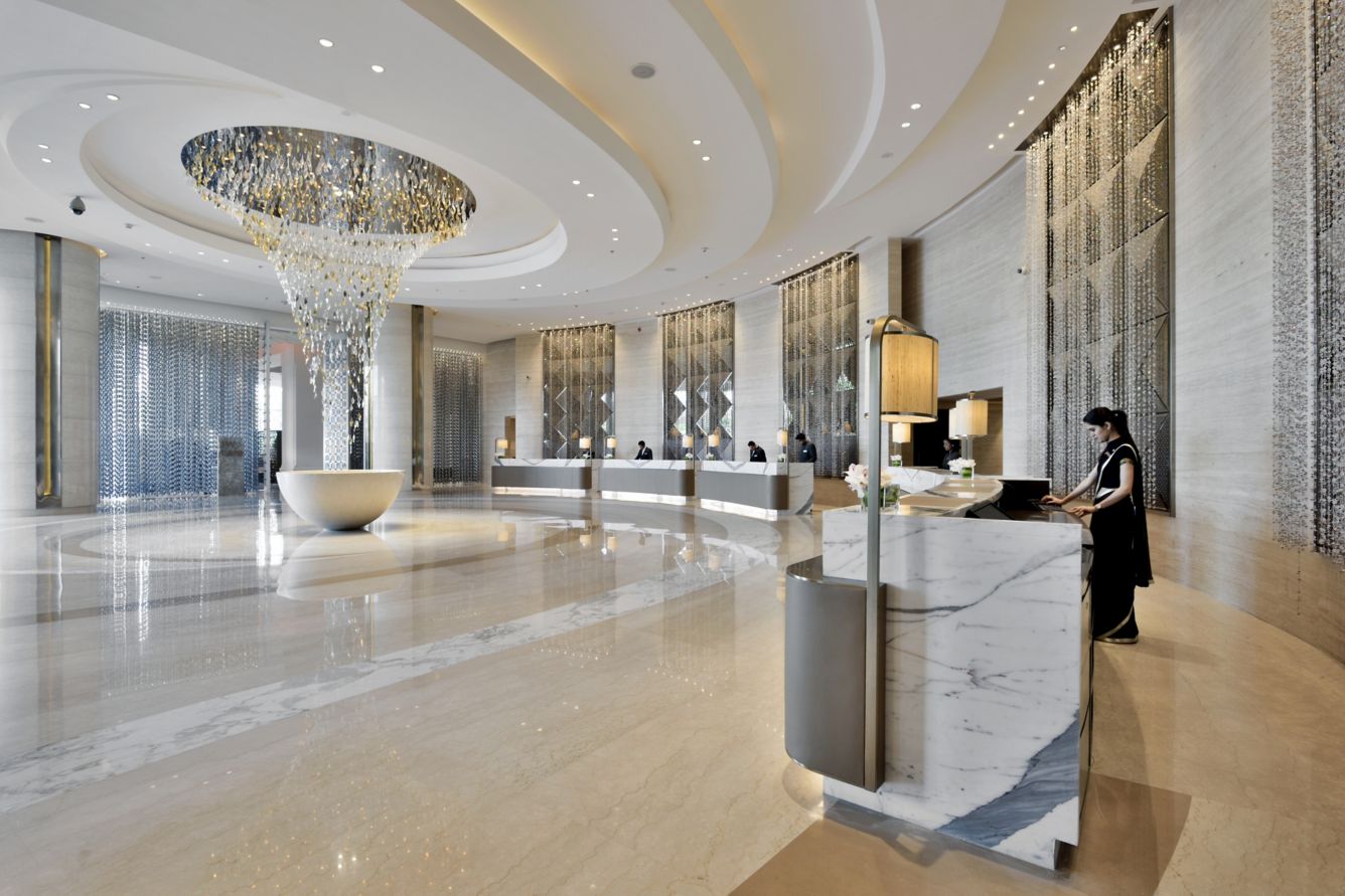 The chandelier-lit lobby of the JW Marriott Mumbai Sahar